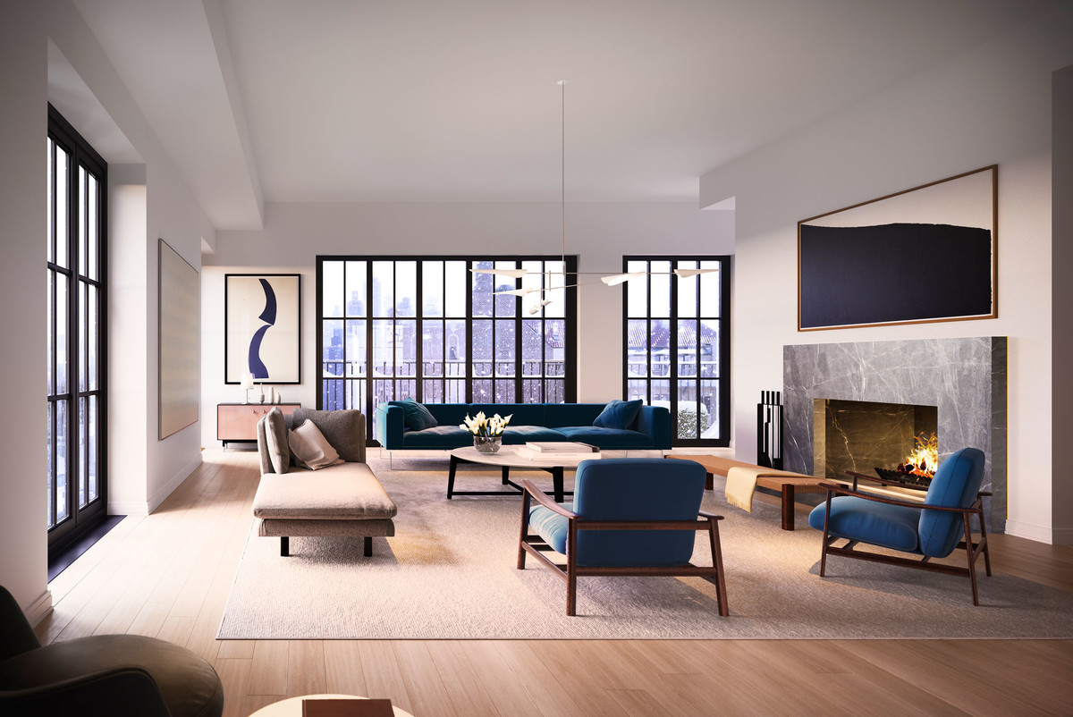 The living room in the penthouse allows for several seating areas and leads graciously into the formal dining room. The room is anchored by a modern Mariana soapstone fireplace and surrounded by floor-to-ceiling windows with year-round natural light.